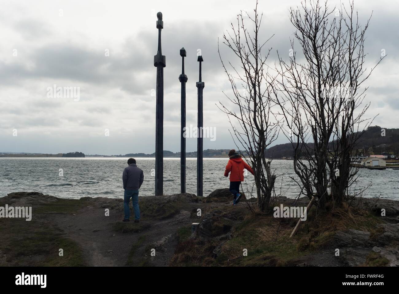 Sverd i fjell swords at stavanger with boy and man Stock Photo