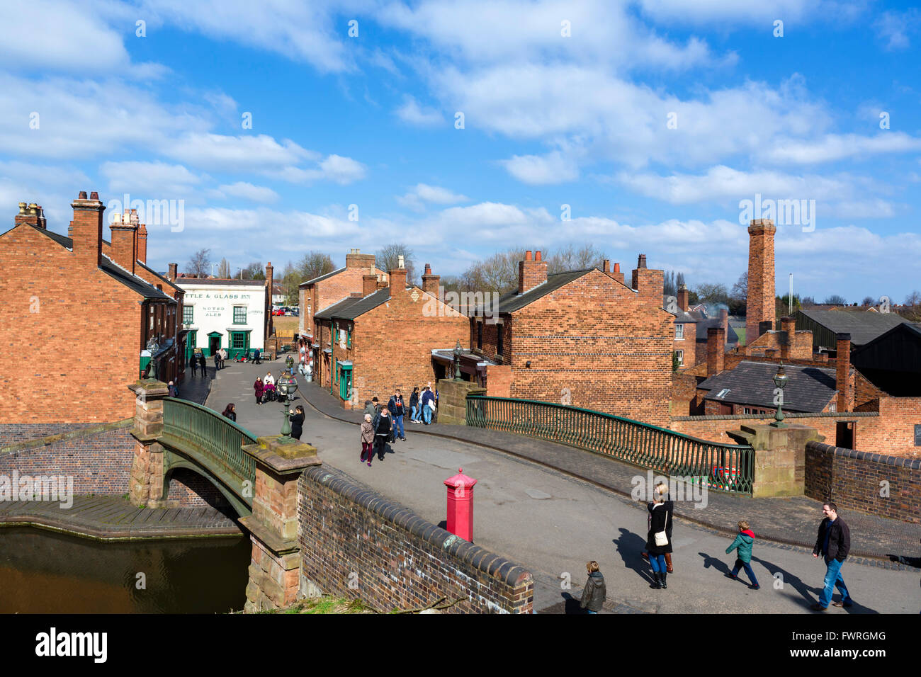 Bridge over the canal and old shops in the village centre, Black Country Living Museum, Dudley, West Midlands, UK Stock Photo