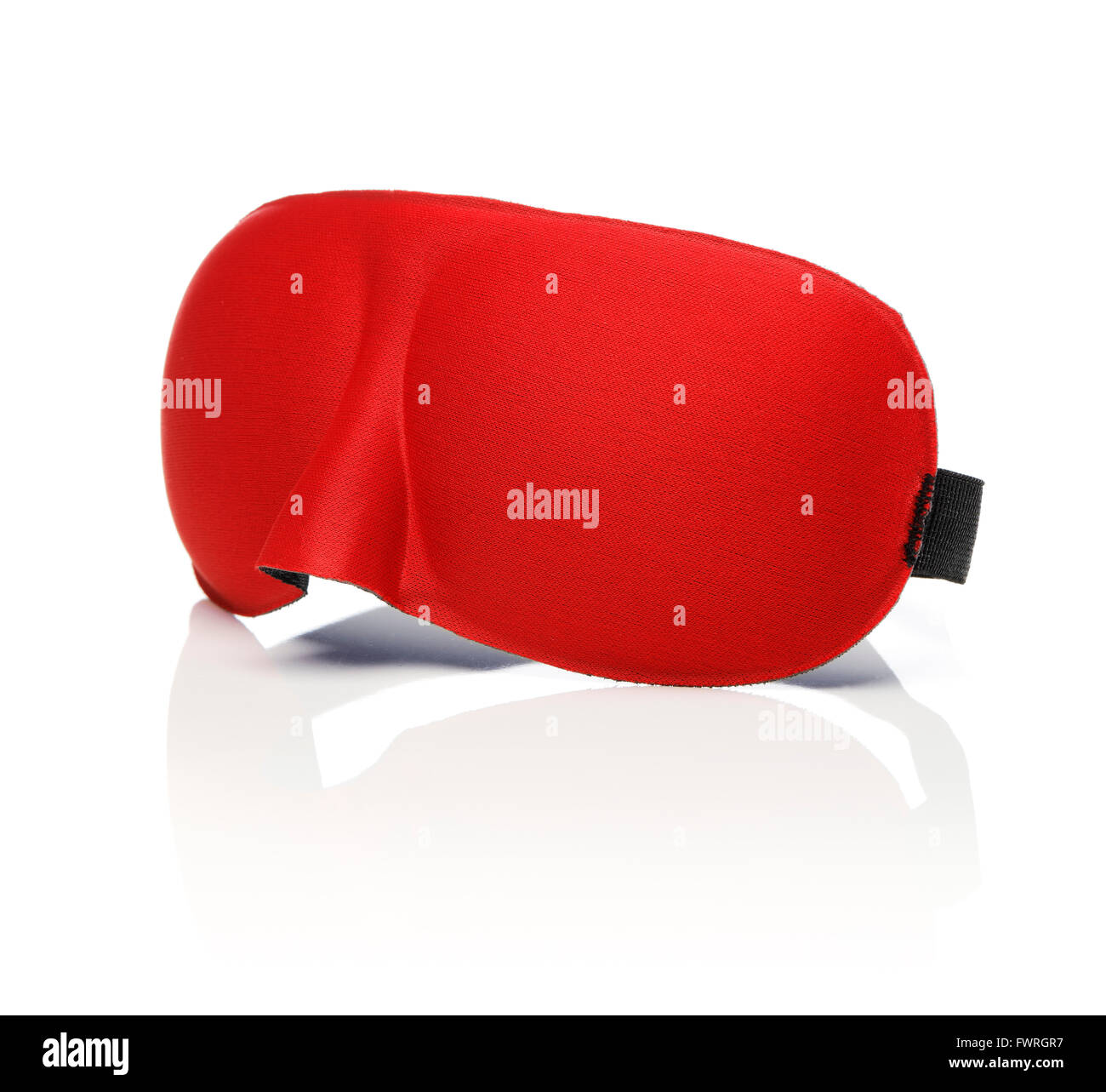 Red sleep mask isolated on white with reflection. Stock Photo