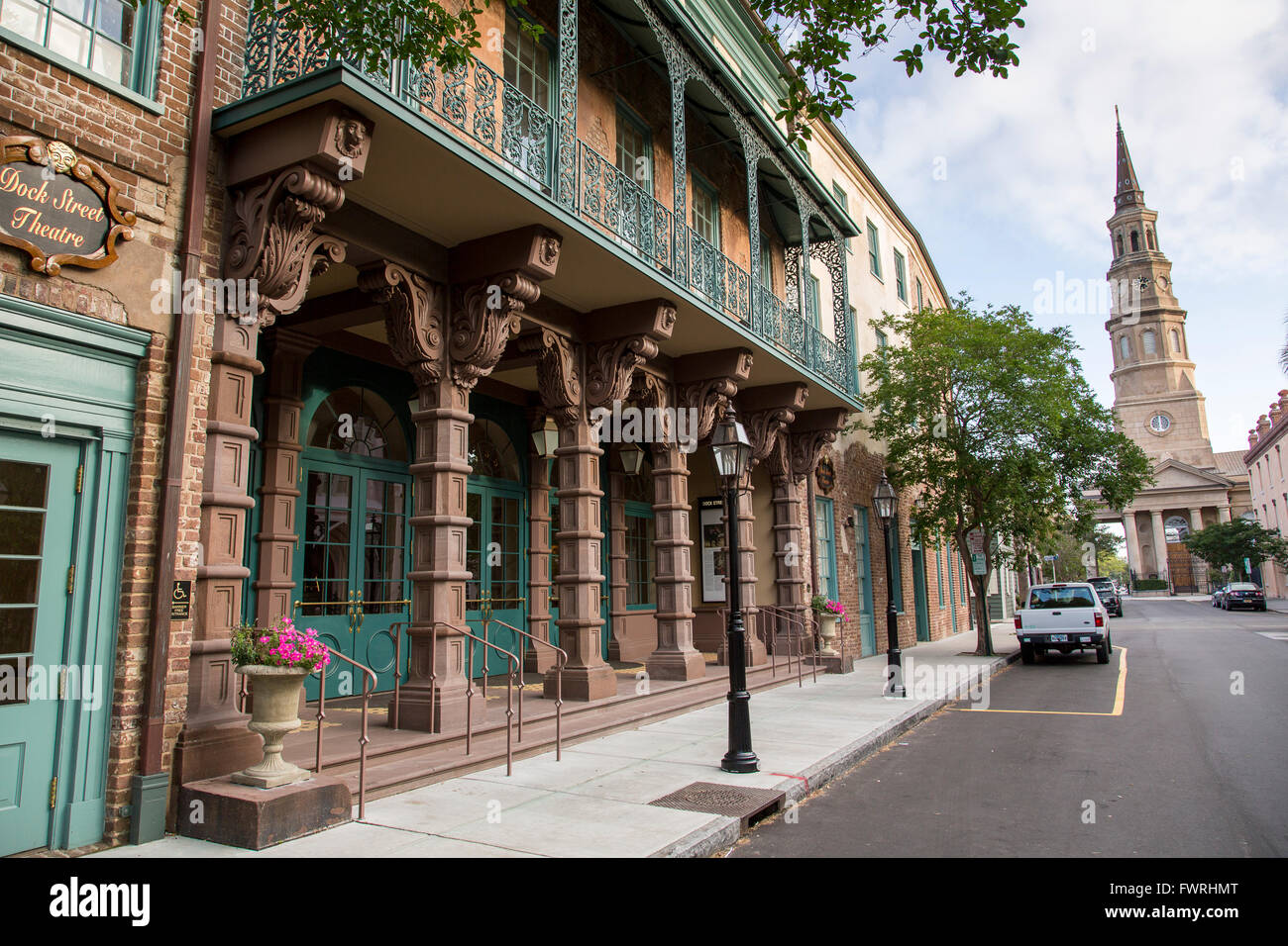 Restored Dock Street Theatre with St. Philips Church on Church Street