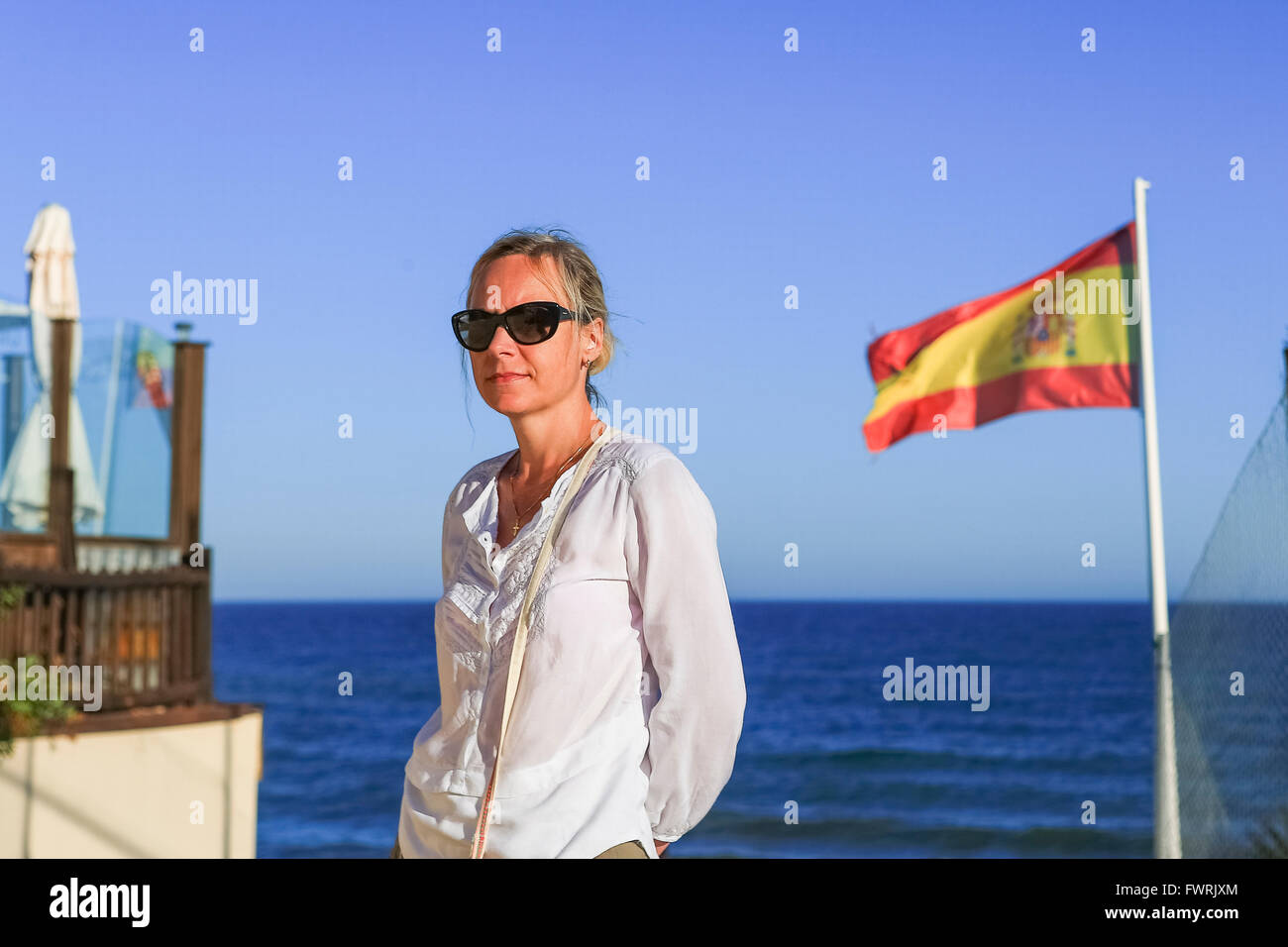 The woman on the Mediterranean coast, Spain Stock Photo