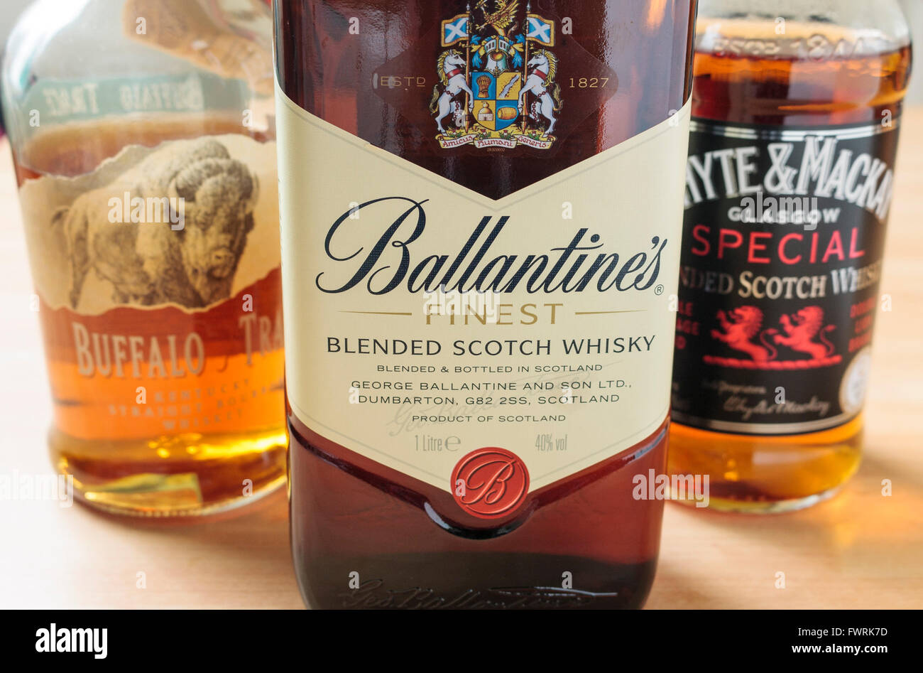 A selection of different types of whiskey - Buffalo Trace (Bourbon), Ballantine's (Scotch) and Whyte & Mackay (Scotch) Stock Photo