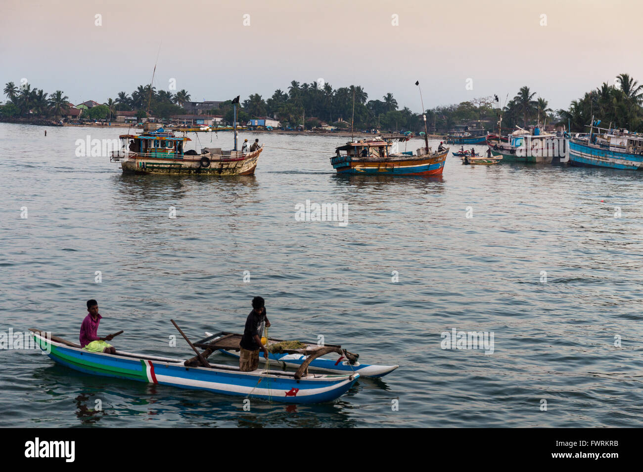 Traditional colorful fishing boats in Negombo harbour, Sri Lanka, Asia Stock Photo