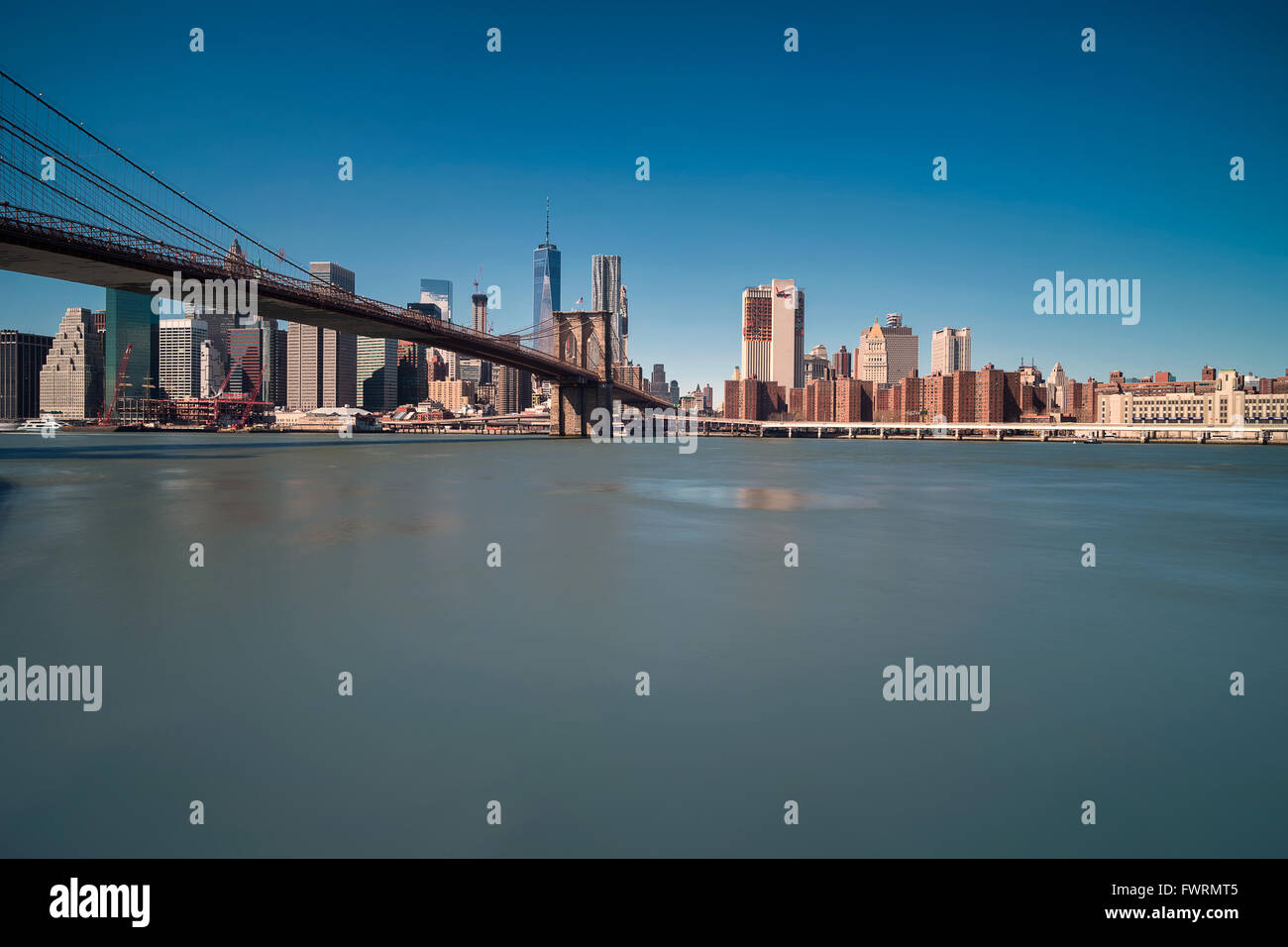View of the Manhattan’s skyline from the Brooklyn side. Stock Photo