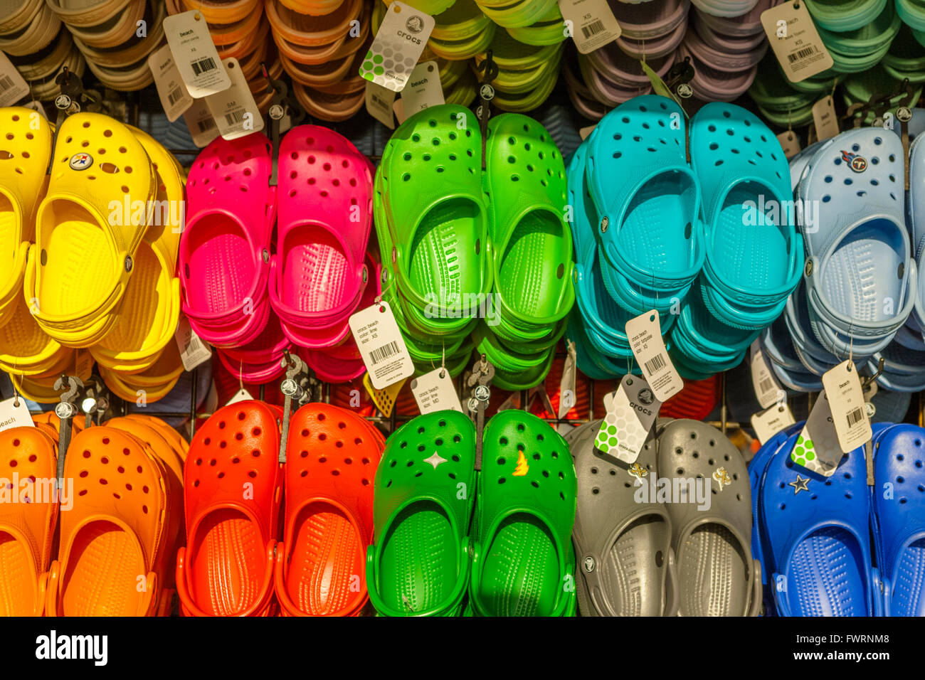 shoes for sale on maui - colorful Crocs Stock Photo