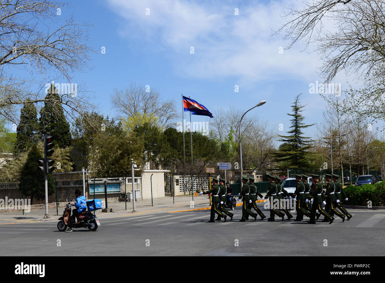 Chinese military / security forces marching by the Cambodian embassy in Beijing. Stock Photo