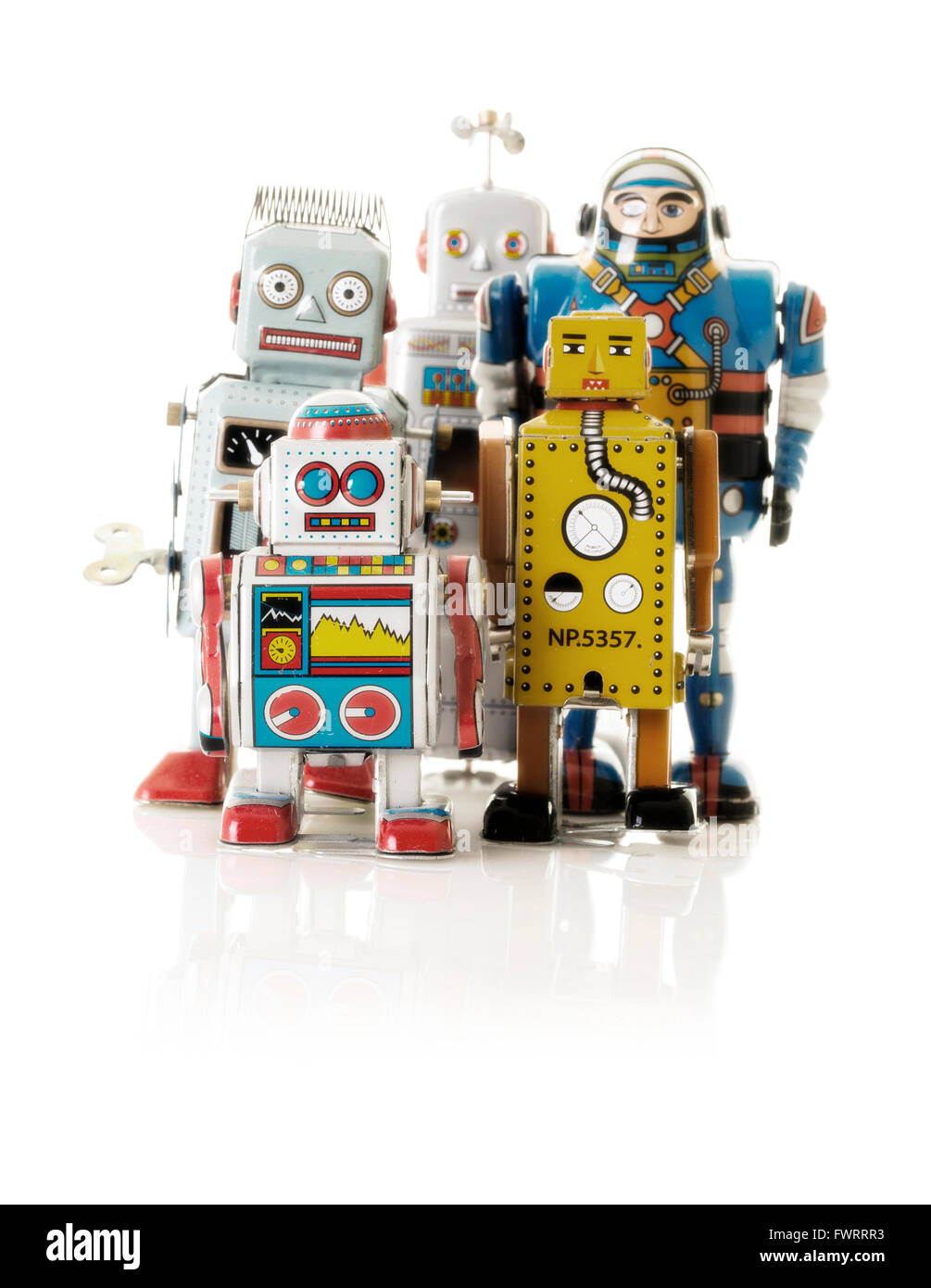 Collection of  Retro Tin Clockwork Robots on a White Background Stock Photo