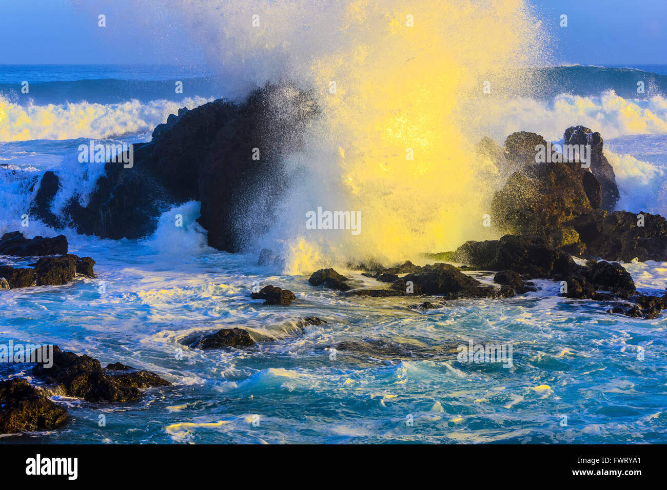 huge waves breaking on rock formations  Ho'okipa Beach, Maui Stock Photo