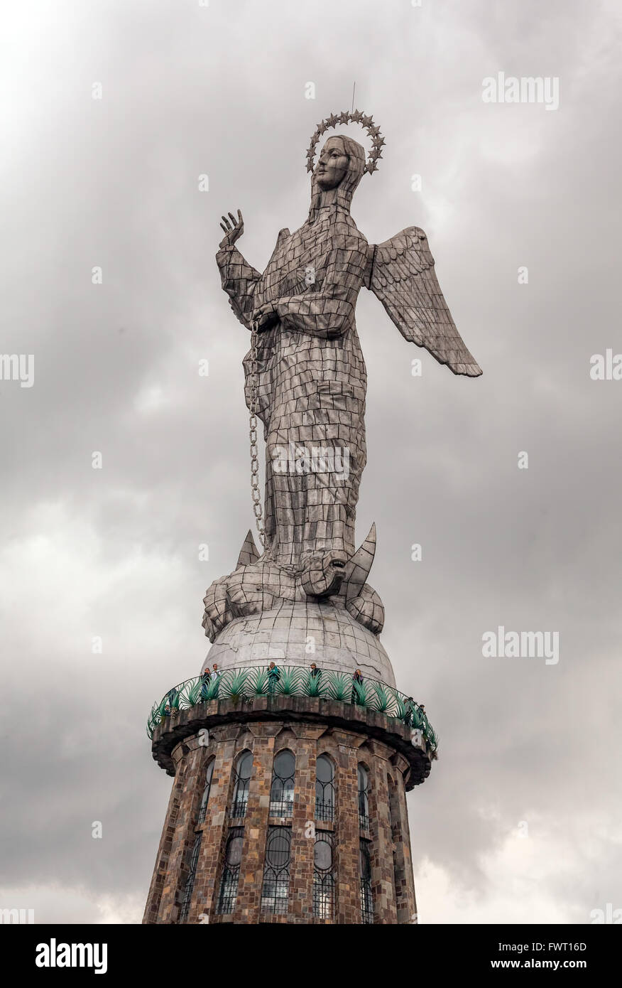 Tall Stone Monument Of A Madonna Which Was Assembled On A High Pedestal On The Top Of Panecillo, Ecuador Stock Photo