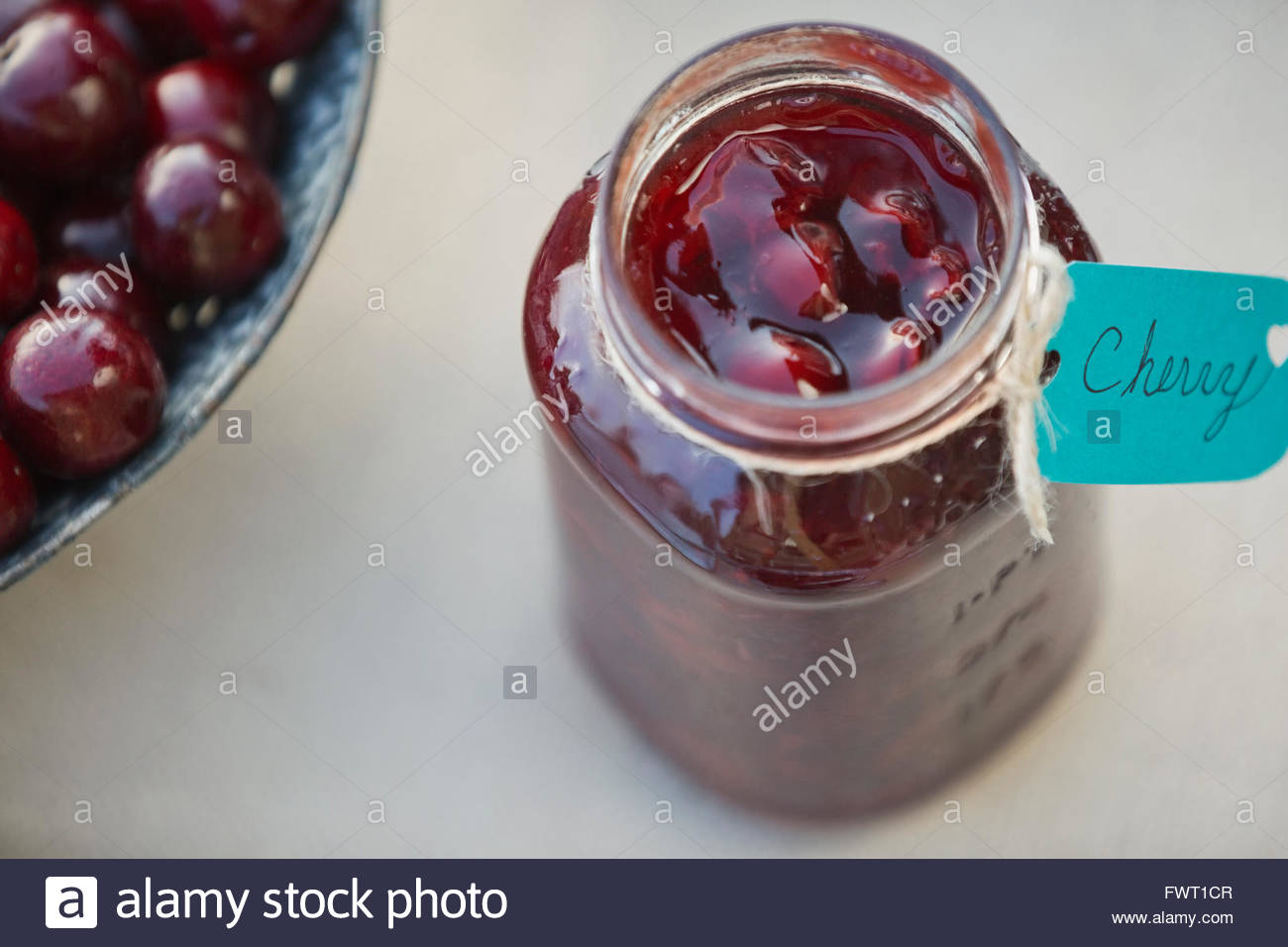 Canned cherry preserves Stock Photo