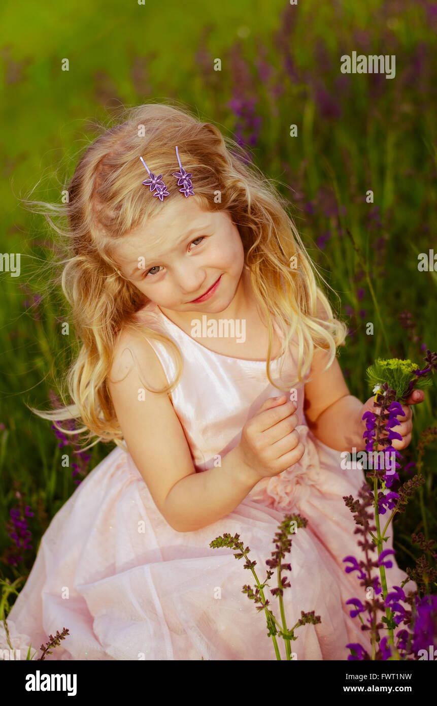 adorable little girl with long blond hair portrait Stock Photo - Alamy