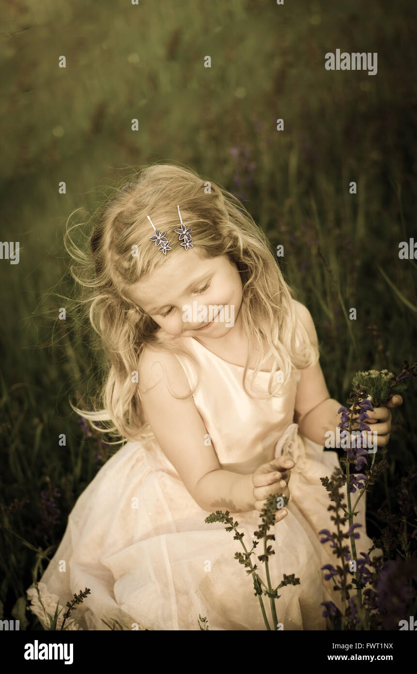Little girl blond hair hi-res stock photography and images - Alamy