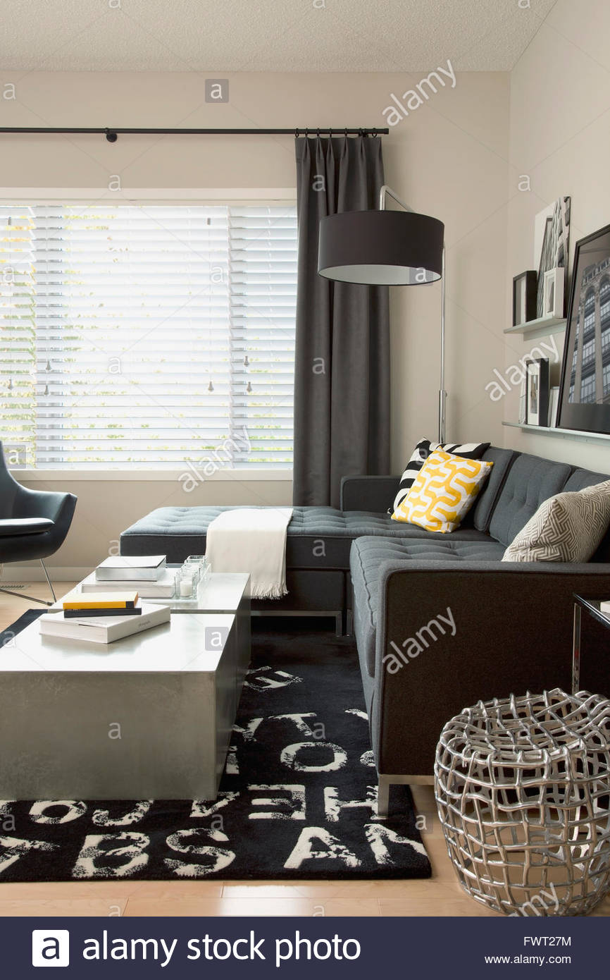 Black sectional sofa in contemporary living room Stock Photo