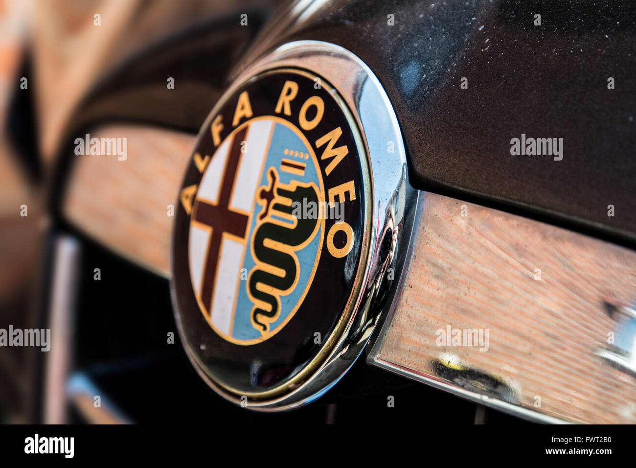 A close up of an Alfa Romeo badge. Stock Photo
