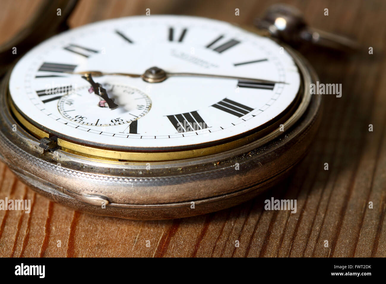 Antique watch on wood background Stock Photo - Alamy