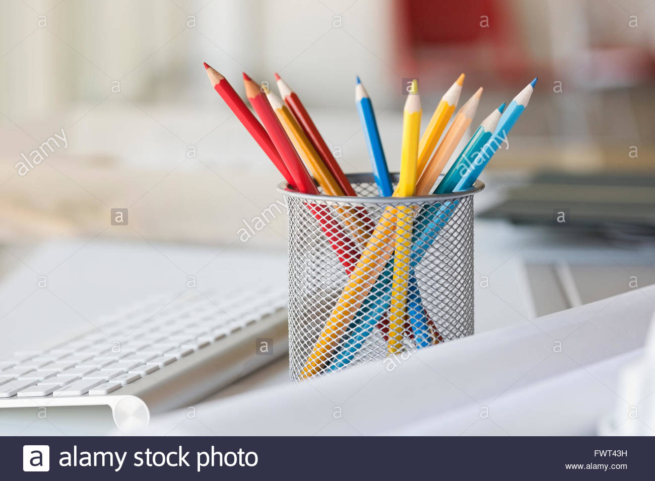 Desktop organizer with coloured pencils Stock Photo