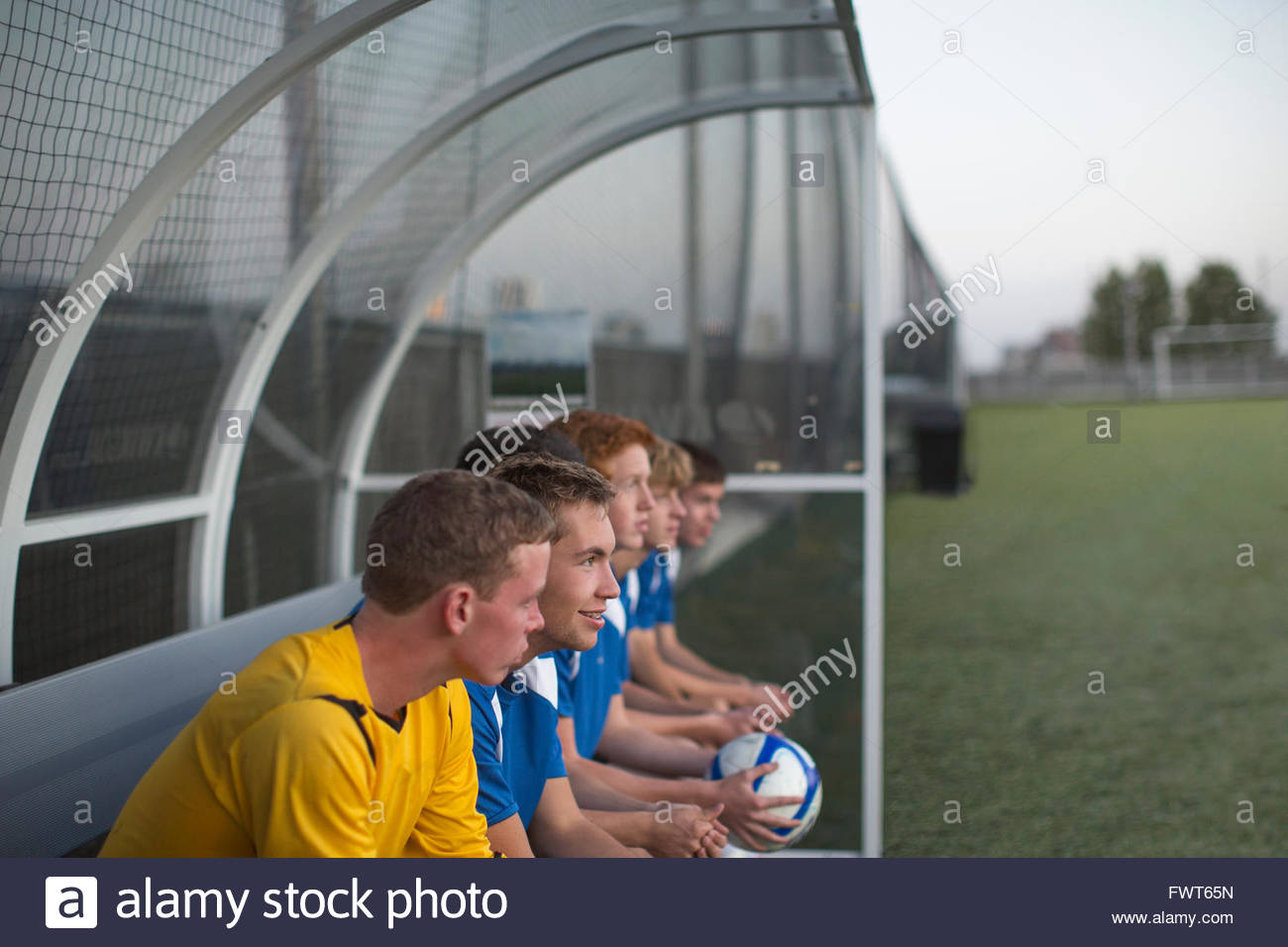 Soccer player sitting on bench hires stock photography and images Alamy