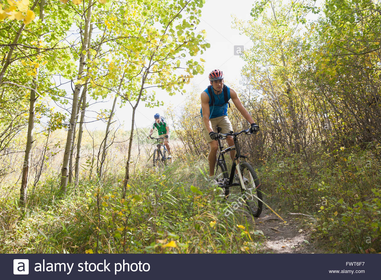 Two men riding High Resolution Stock Photography and Images - Alamy