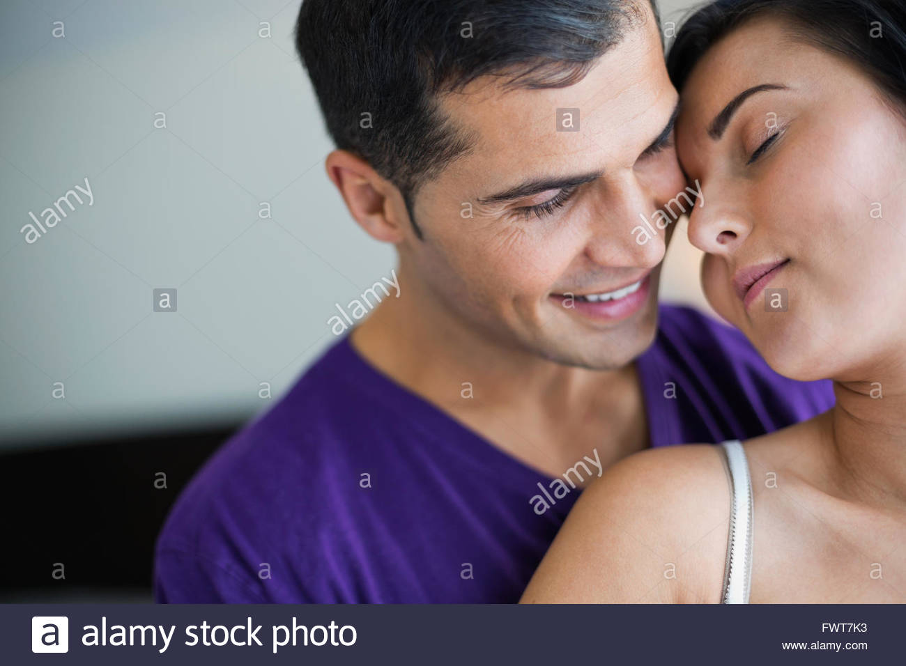 Close-up of happy couple being affectionate Stock Photo