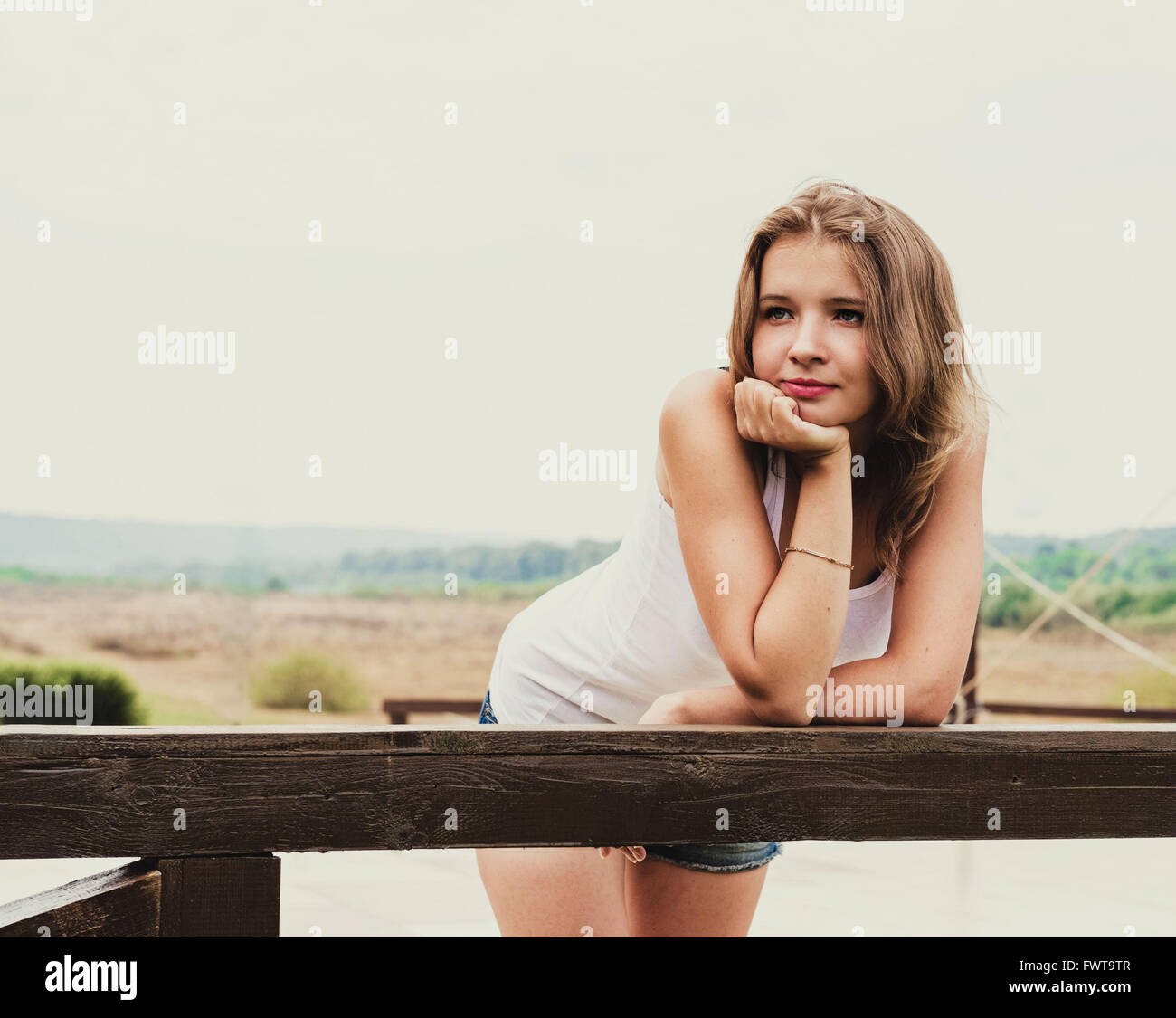 Portrait of a beautiful young woman outdoors Stock Photo - Alamy