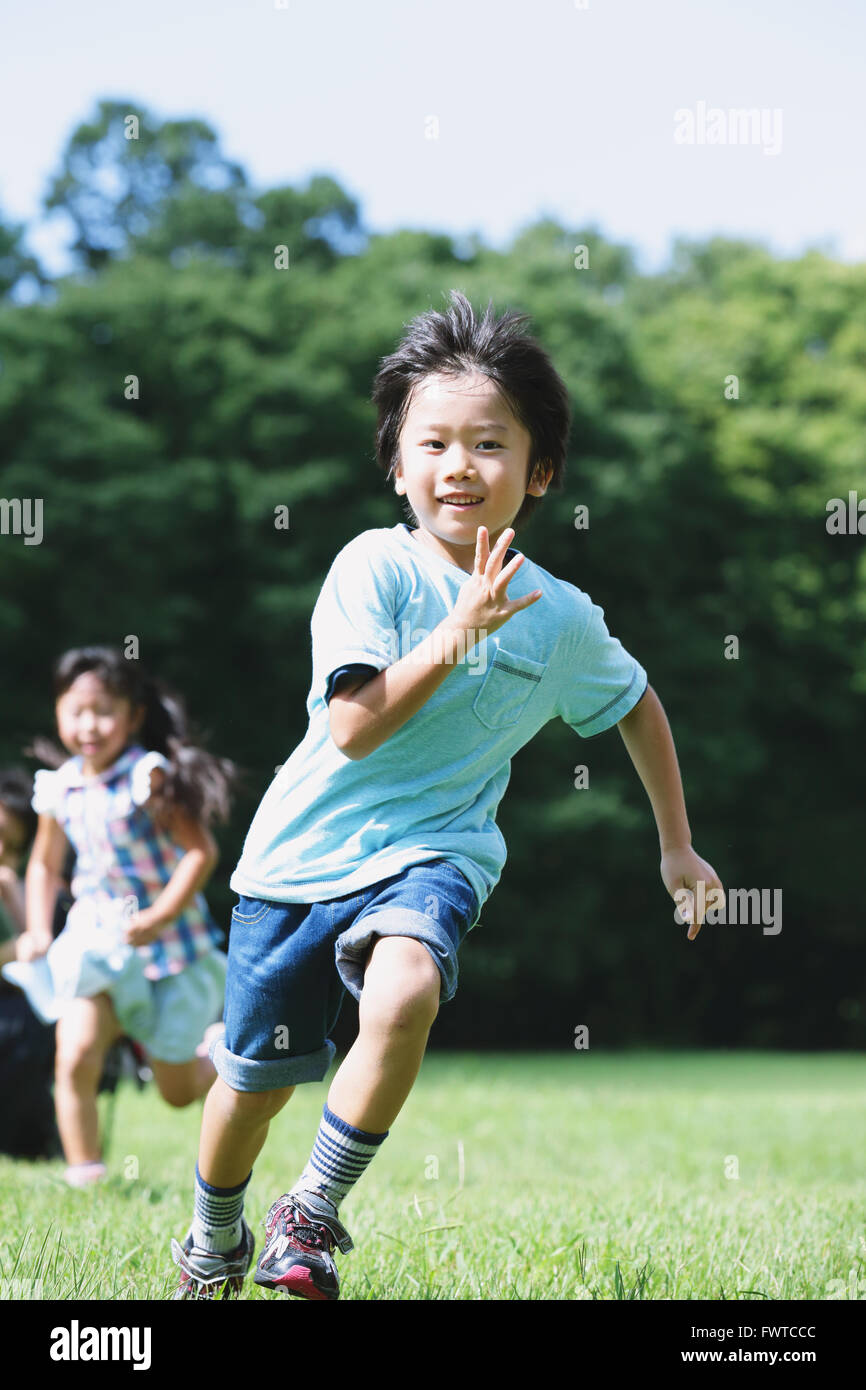 Kids running hi res stock photography and images Alamy