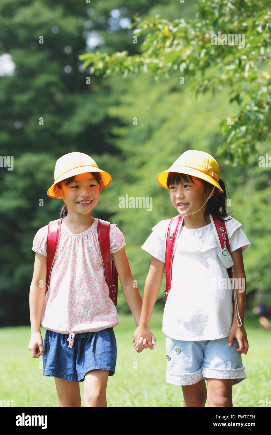 Japanese kid in a city park Stock Photo
