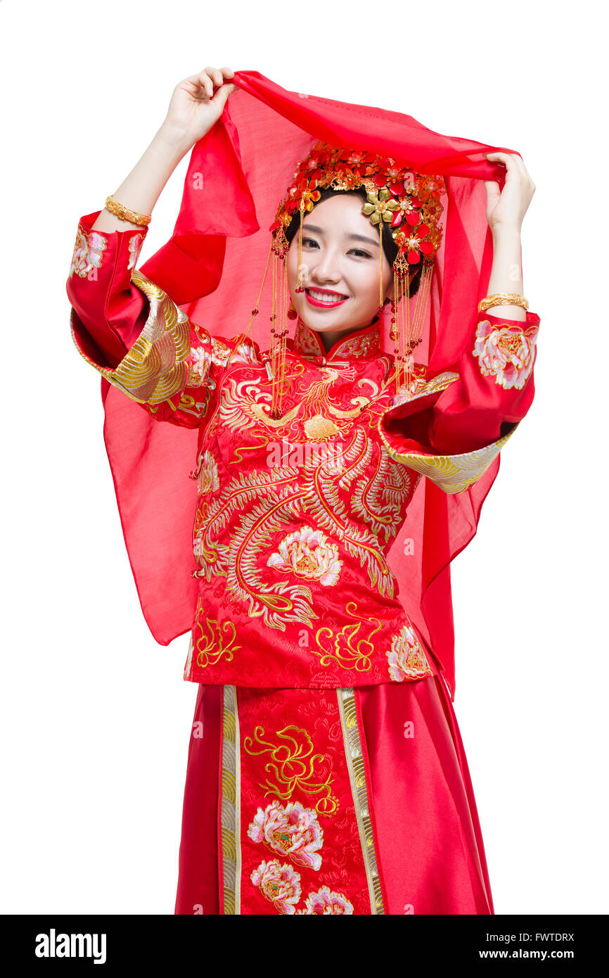 Beautiful bride in Chinese traditional wedding dress Stock Photo - Alamy
