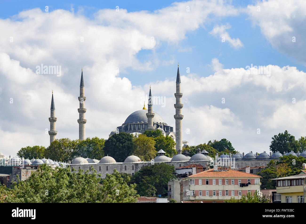 Landscape of the Süleymaniye Mosque against a  blue cloudly sky Stock Photo