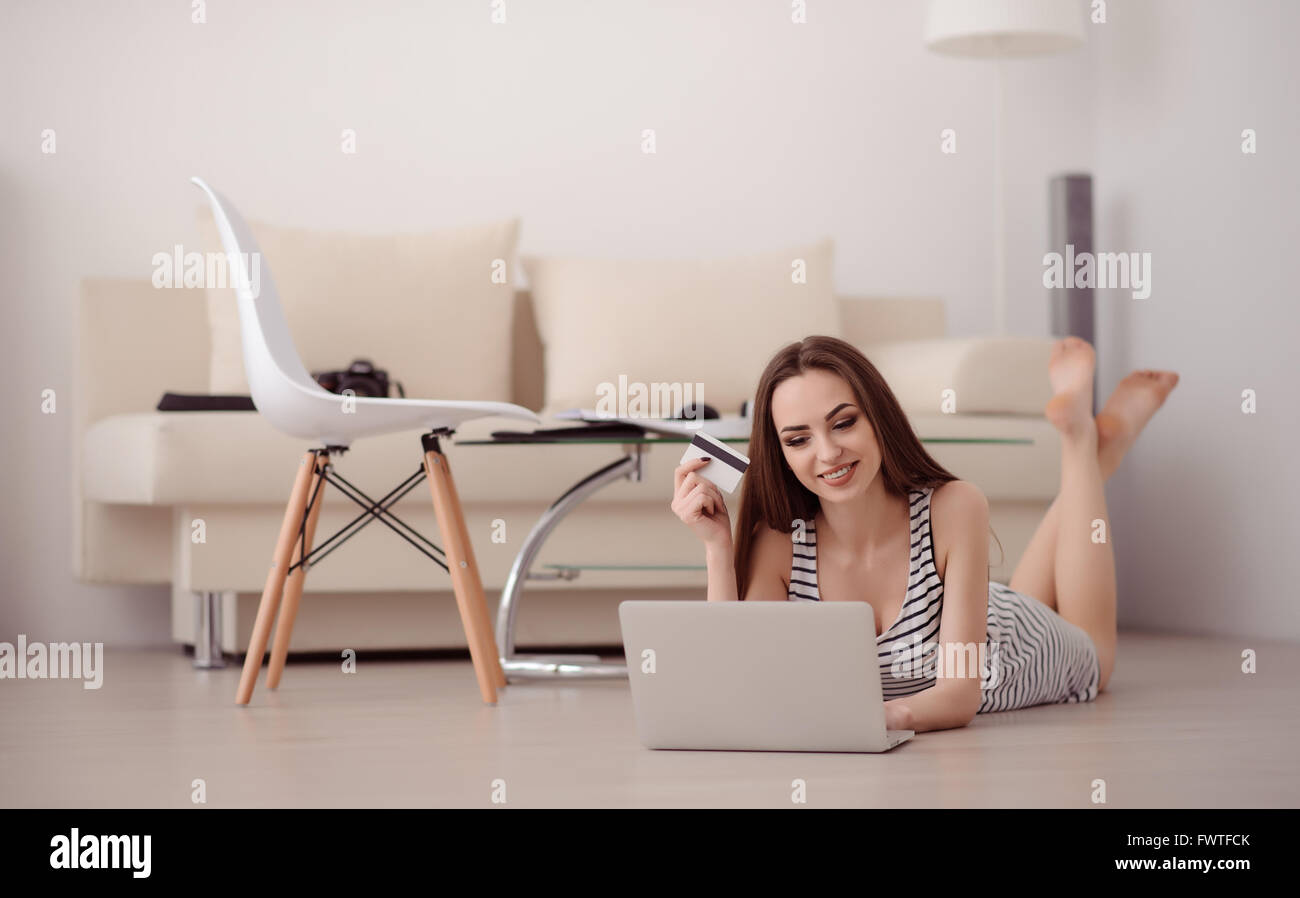 Brunette girl lying on floor hi-res stock photography and images - Alamy