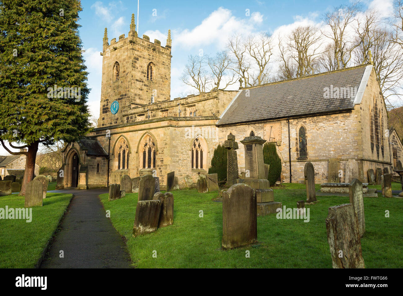 The parish church of St. Lawrence in the Peak District village of Eyam in Derbyshire, UK. Stock Photo