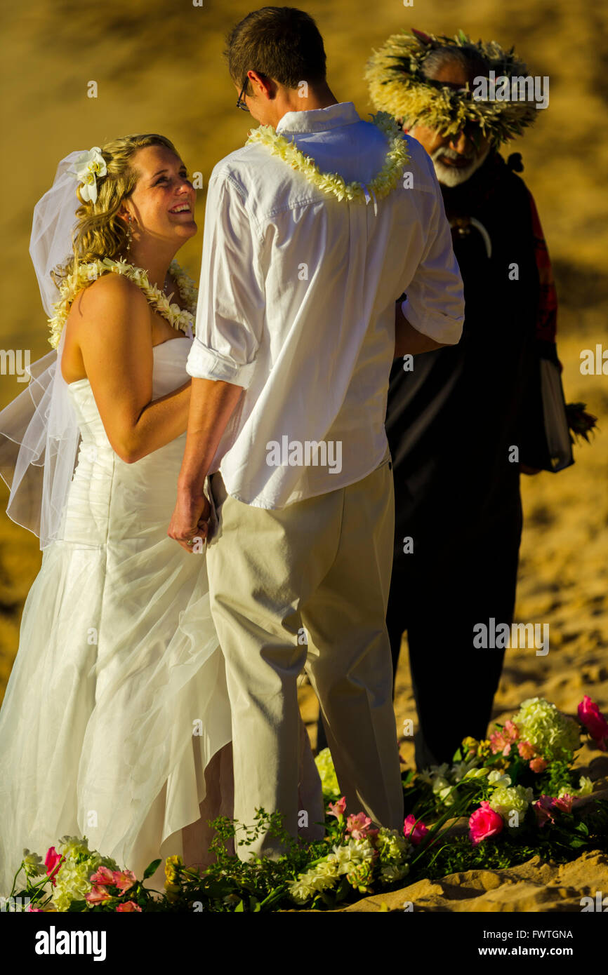 Couple Saying Vows At Beach Wedding Maui Stock Photo