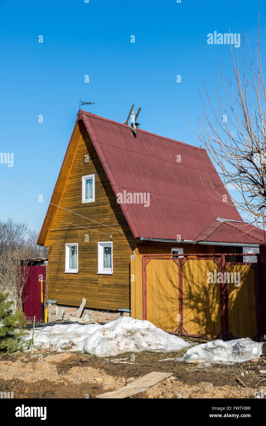 small wooden summer house in the early spring in Russia Stock Photo - Alamy