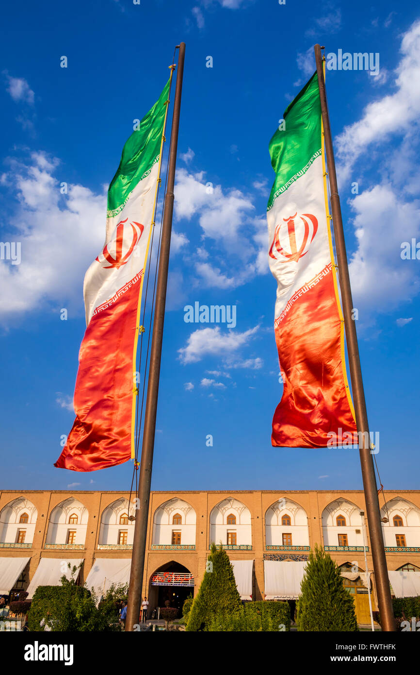 Iranian flags against clear blue sky in Naqsh-e Jahān Square, Esfahan, Iran Stock Photo