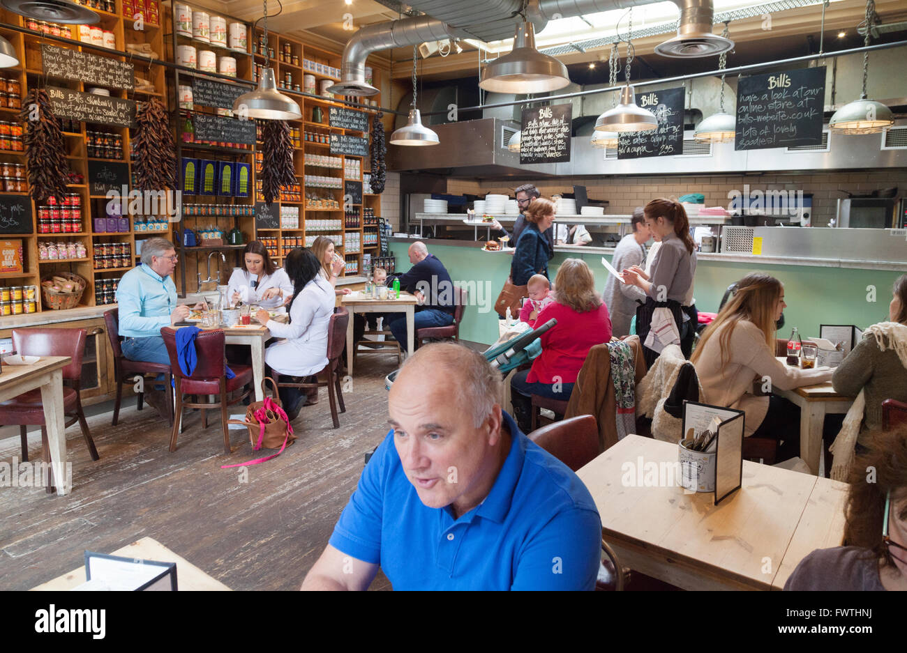 People eating in a restaurant interior, Bill's restaurant, Reading, Berkshire UK Stock Photo