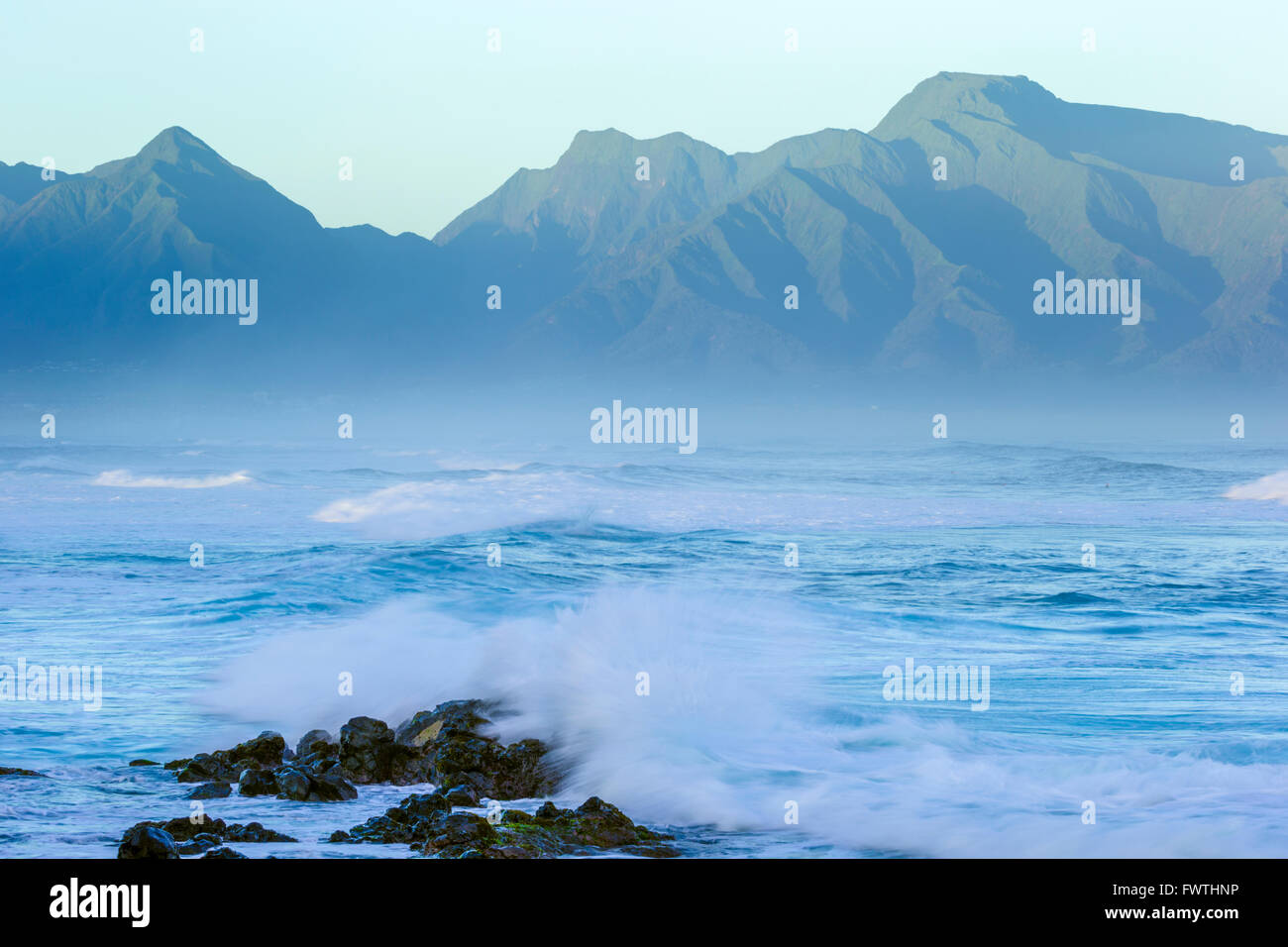 Waves at Ho'okipa Beach Park with West Maui Mountains, Maui Stock Photo