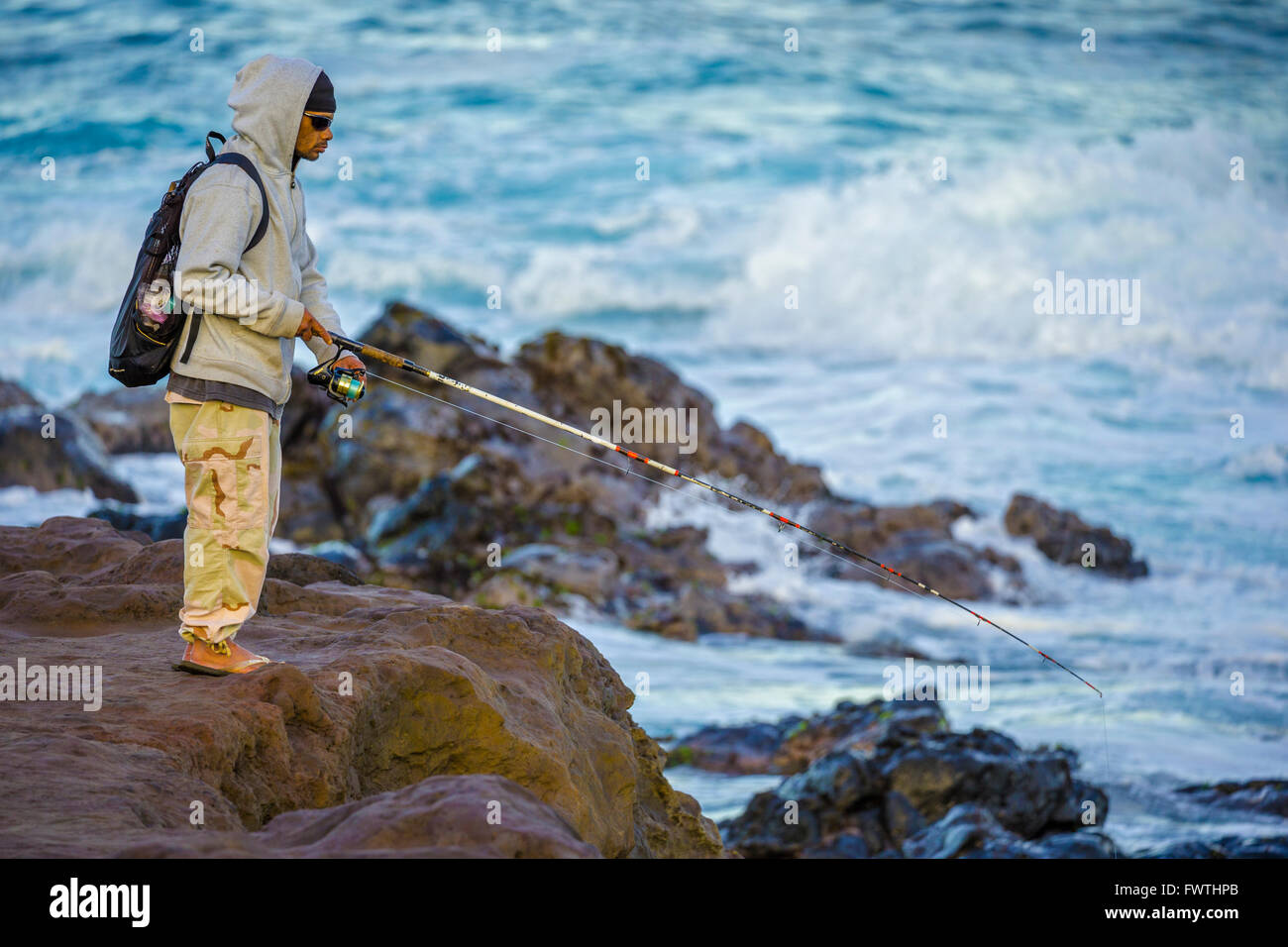 Fishing at Ho'okipa Beach Park, Maui Stock Photo