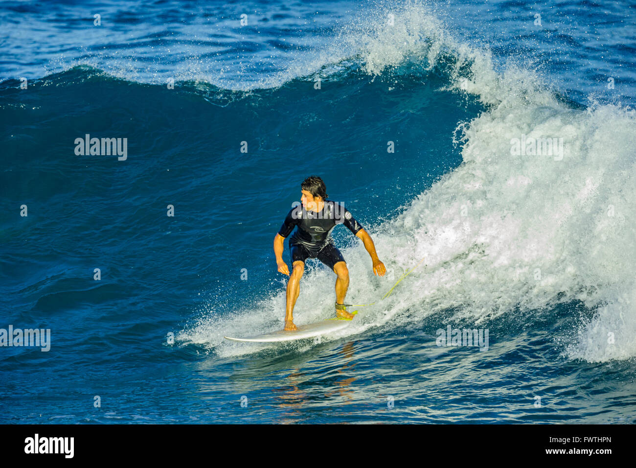 Surfing in Maui Stock Photo