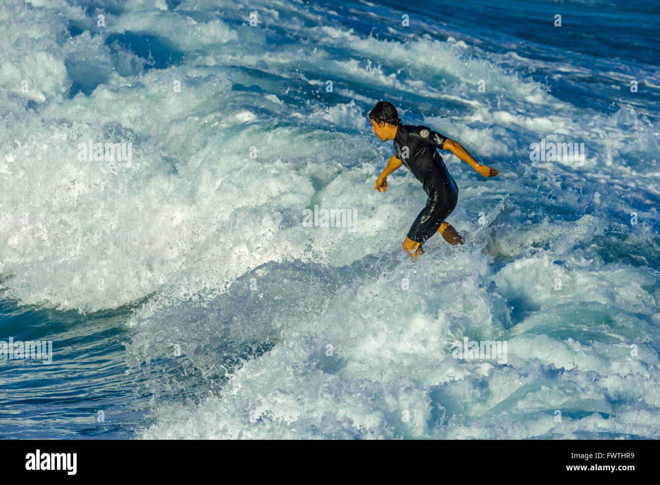 Surfing in Maui Stock Photo Alamy