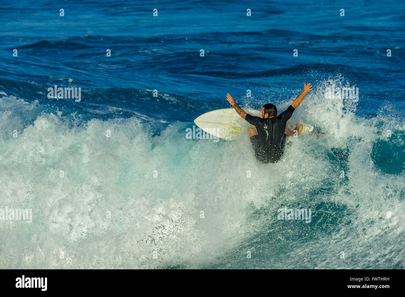 Surfing in Maui Stock Photo Alamy