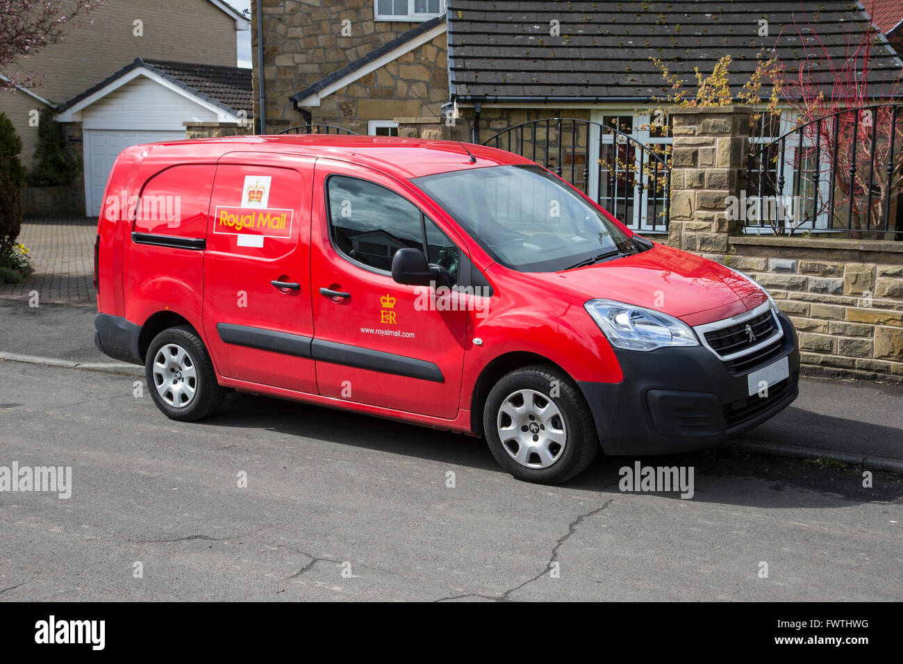 English Royal Mail Post Office van in Post Office Red livery Stock