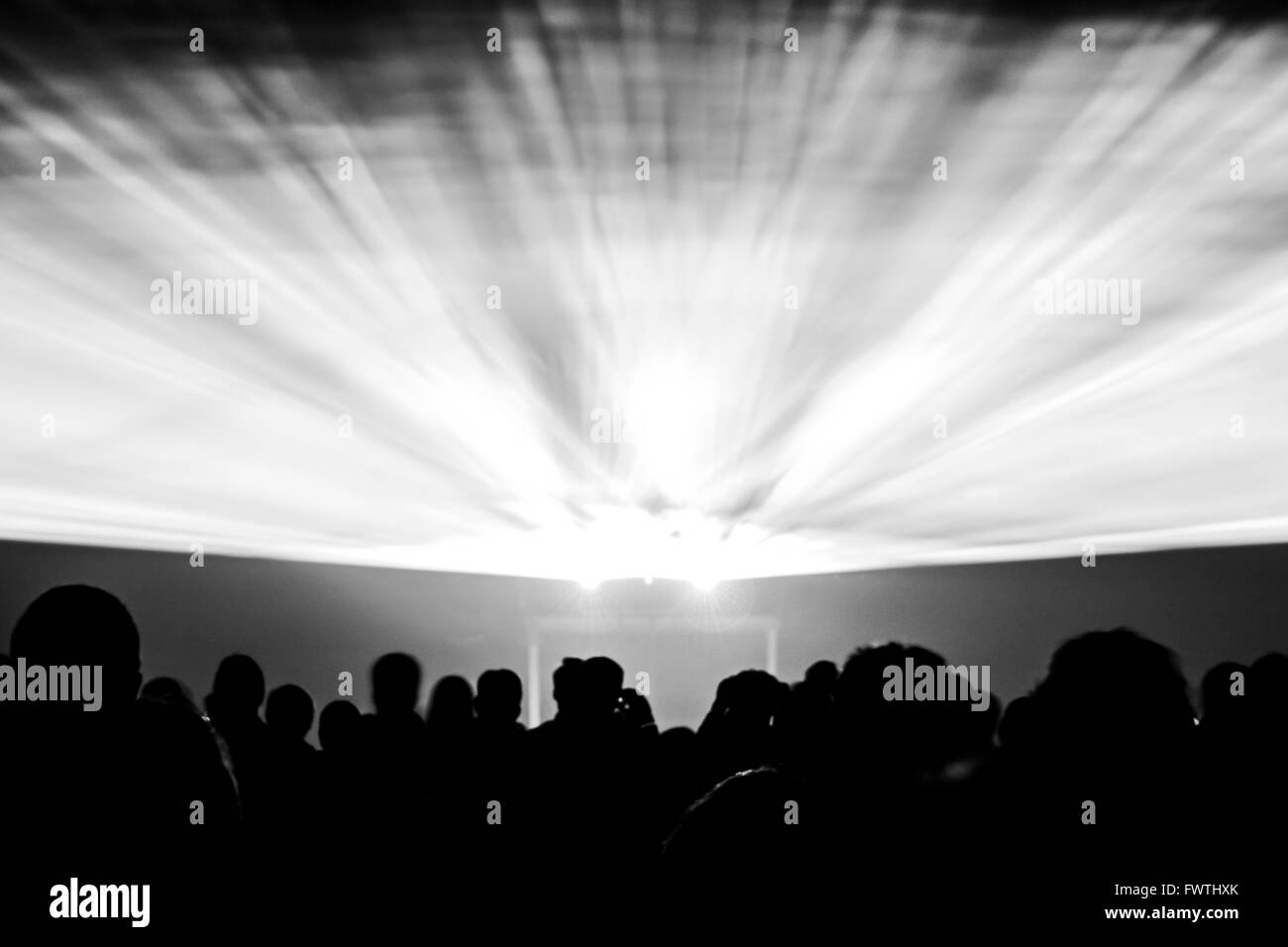 Best visual show with a crowd silhouette and great laser rays for e.g. an illustration background of an invitation flyer Stock Photo