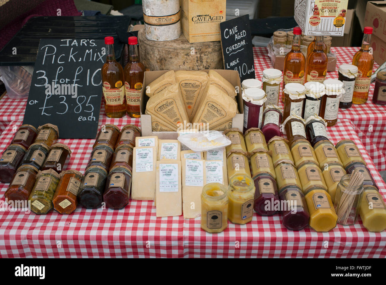 Local produce on a market stall. Wells, Somerset, England Stock Photo