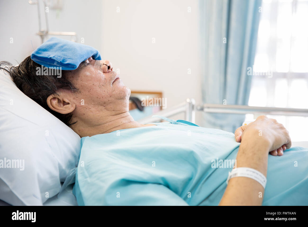mature senior man Patient sleeping in hospital bed Stock Photo Alamy
