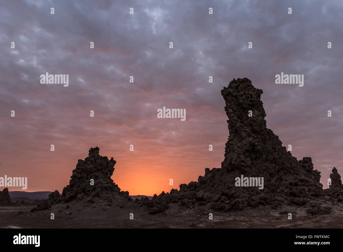 Rock Formations at dawn Lake Abbe, Djibouti, Africa Stock Photo