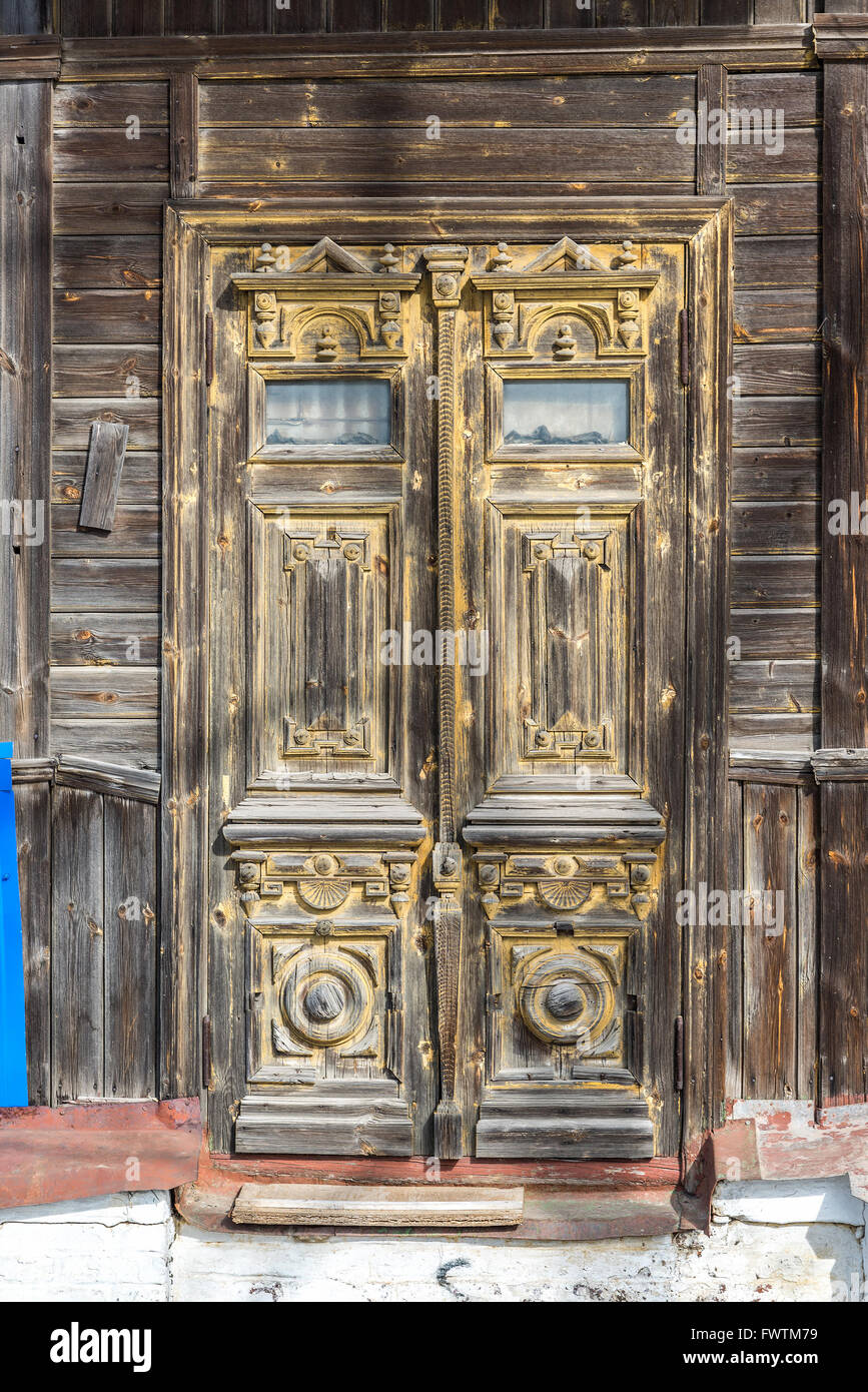 Carved wooden door of  old house, Russia Stock Photo