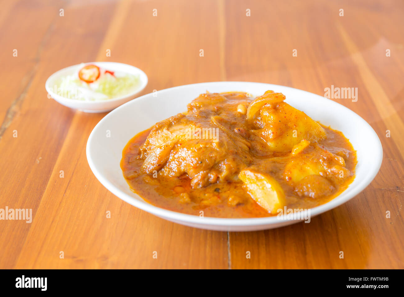 Thai Massaman durian curry with chicken and Stock Photo