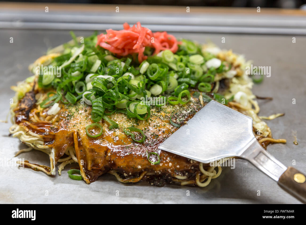 okonomiyaki japanese pizza hiroshima style Stock Photo