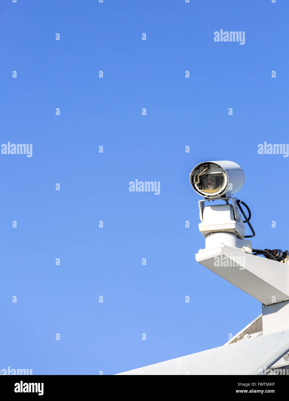 CCTV security camera over blue sky Stock Photo - Alamy