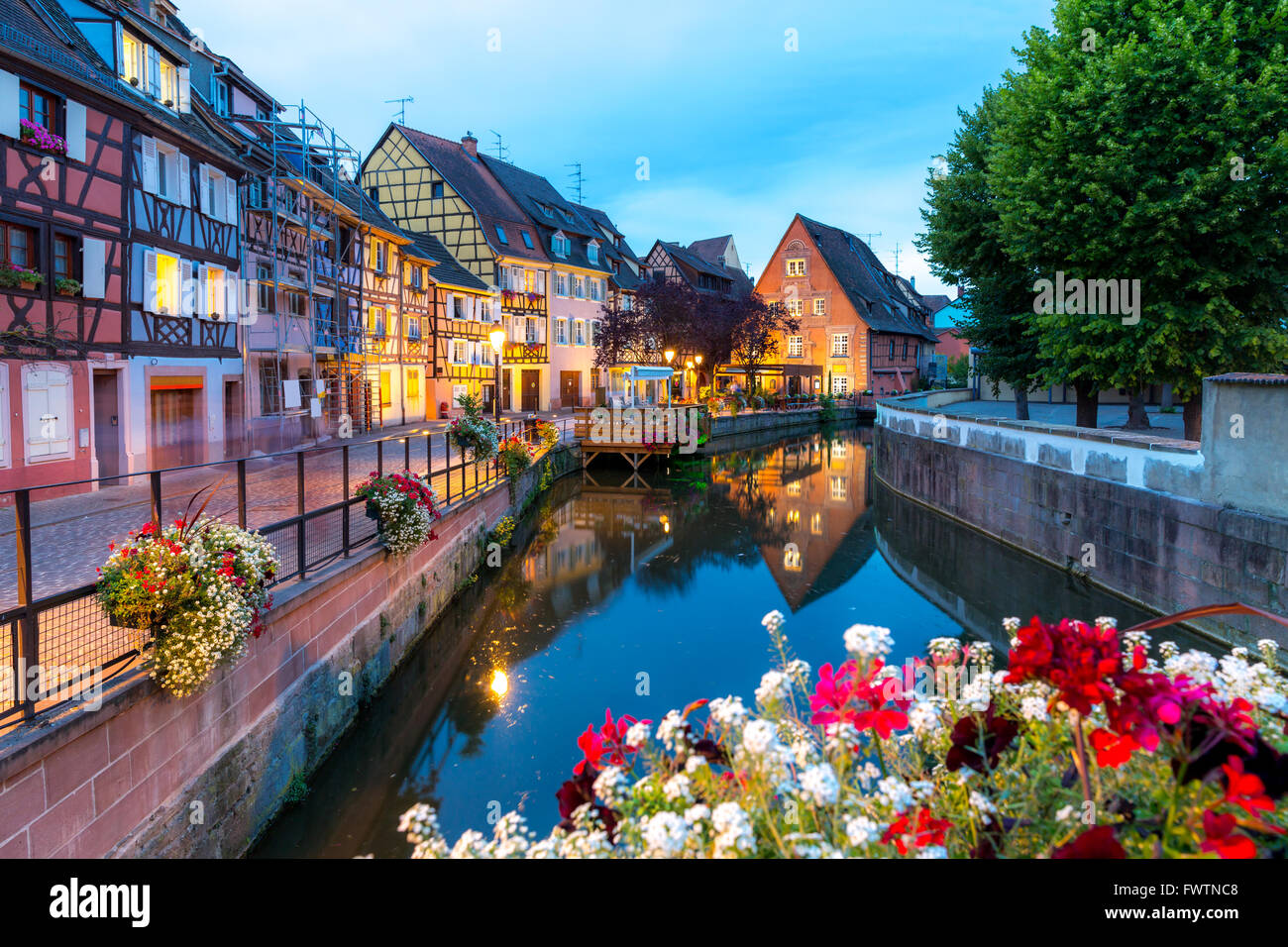 Colmar, Petit Venice, at dusk water canal and traditional colorful houses. Alsace, France. Stock Photo