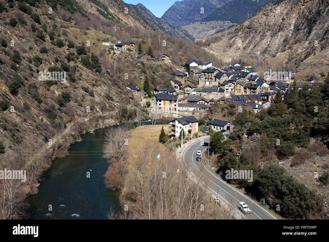 View of Llavorsi village located along river Noguera Pallaresa in province of Lleida Catalonia Spain Stock Photo